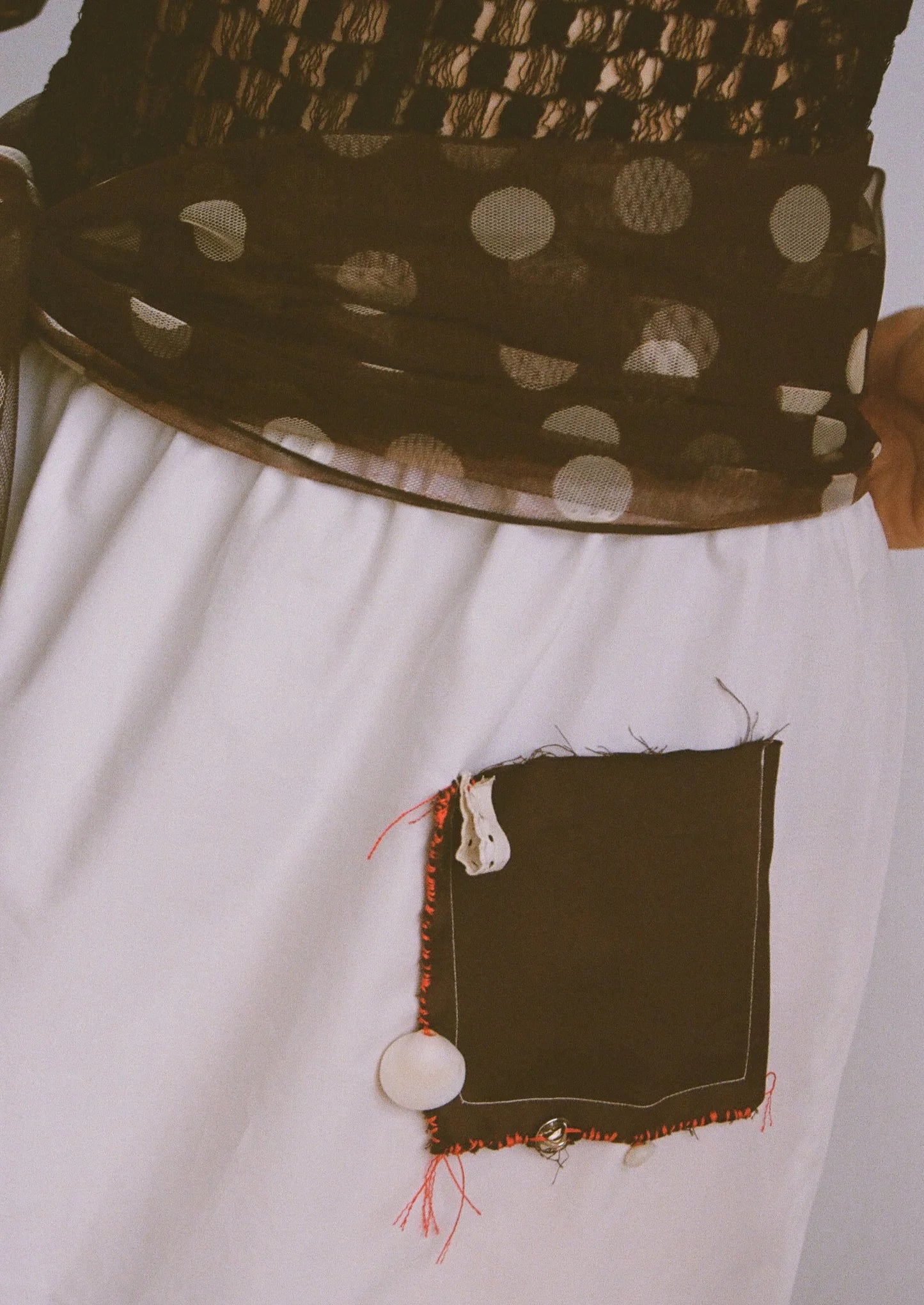 everyone's mother - brown and white polka dot skirt