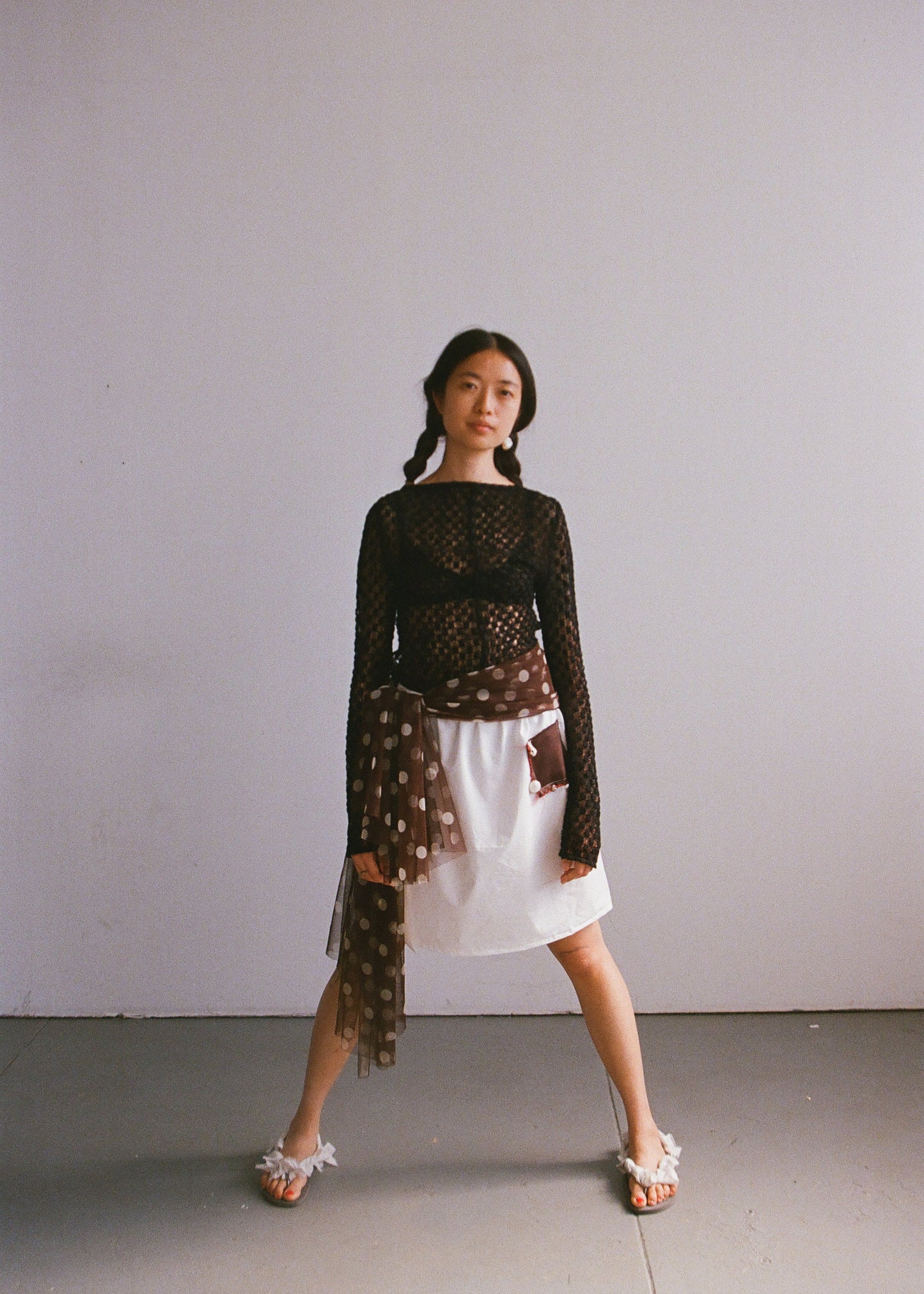 everyone's mother - brown and white polka dot skirt