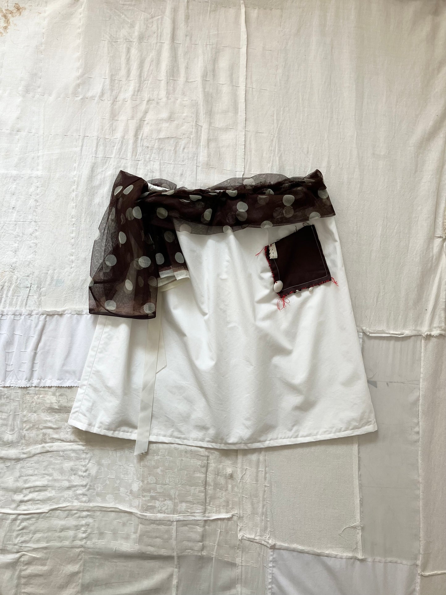 everyone's mother - brown and white polka dot skirt