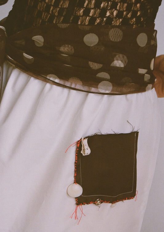 everyone's mother - brown and white polka dot skirt